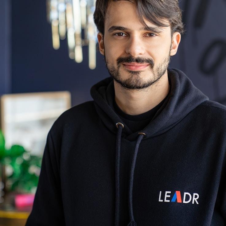 Mira Singh, Lead Design Curator at CenterStablePathway, reviewing corporate floral arrangements